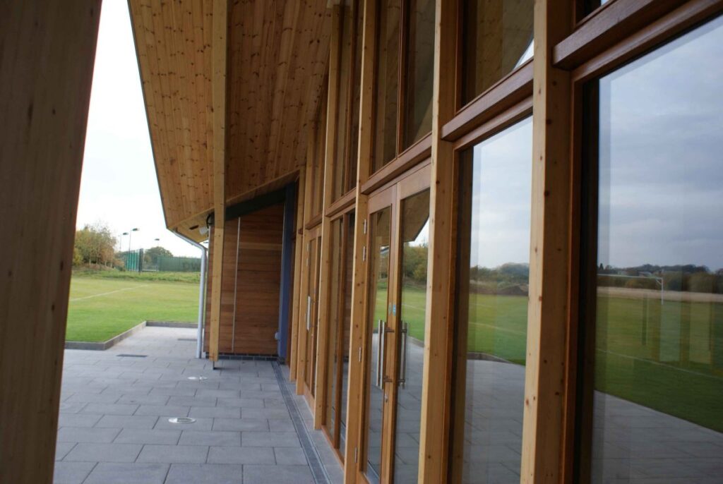 Dixie Grammar School Sports Pavilion: glazed timber colonnade overlooking the playing fields